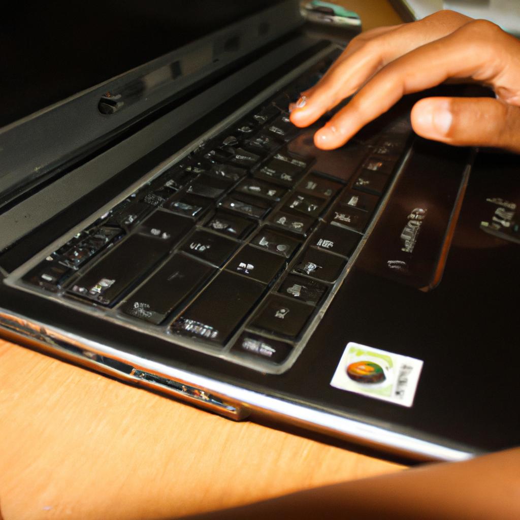 Person using laptop for borrowing
